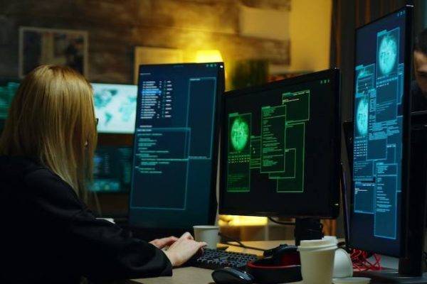 20230821162235_[fpdl.in]_beautiful-hacker-girl-working-with-another-dangerous-cyber-criminals-hackers-centre_482257-21839_medium